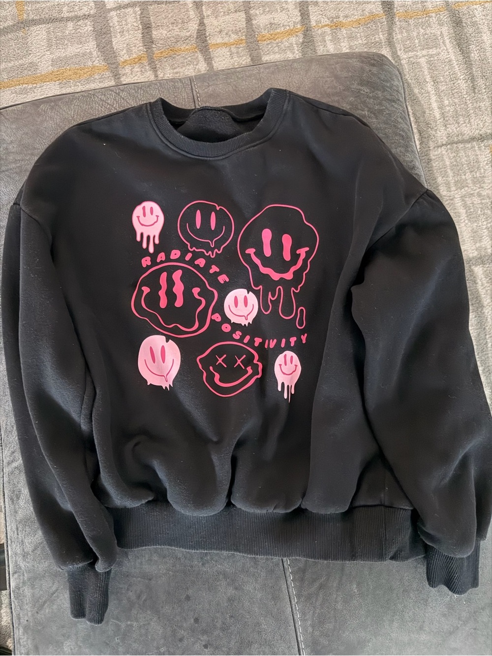 Black Sweatshirt with Pink Drip Smile Graphic